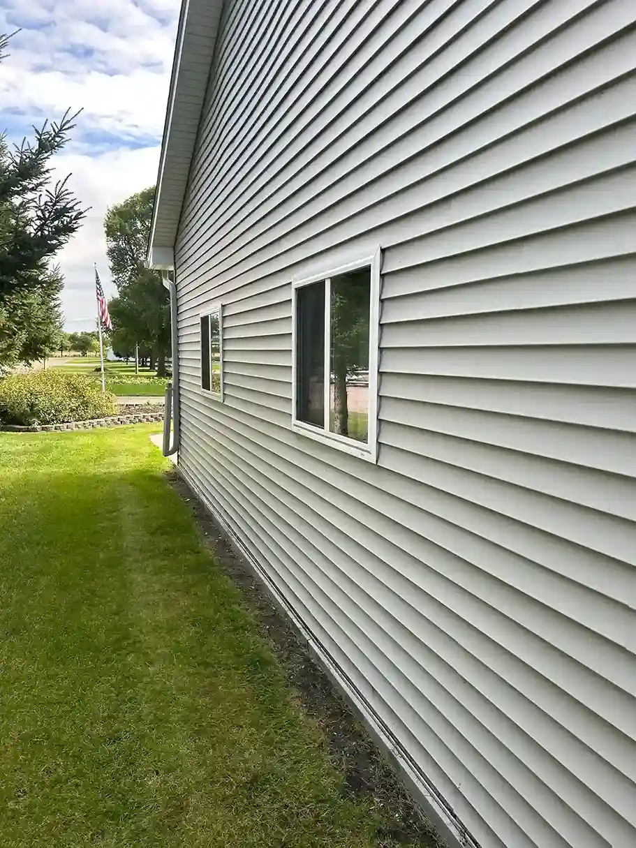 Brick, stone, and stucco delicate exterior wall soft washing in Morris MN