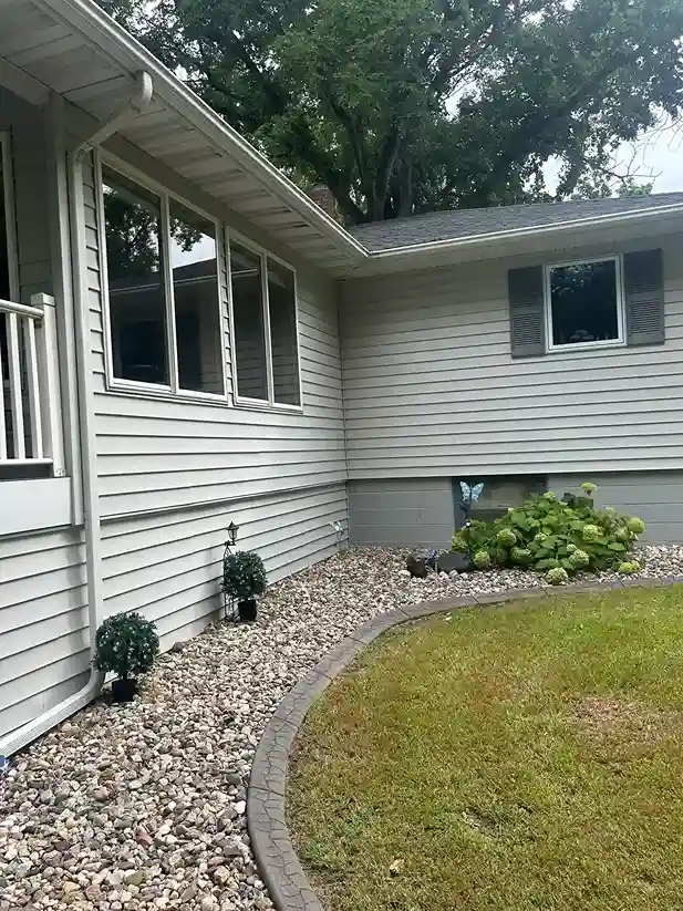 Exterior house wall gentle chemical soft wash treatment in Morris MN