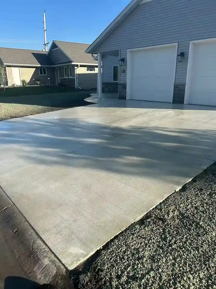 Winter deicing salt and grime removed from residential concrete driveway