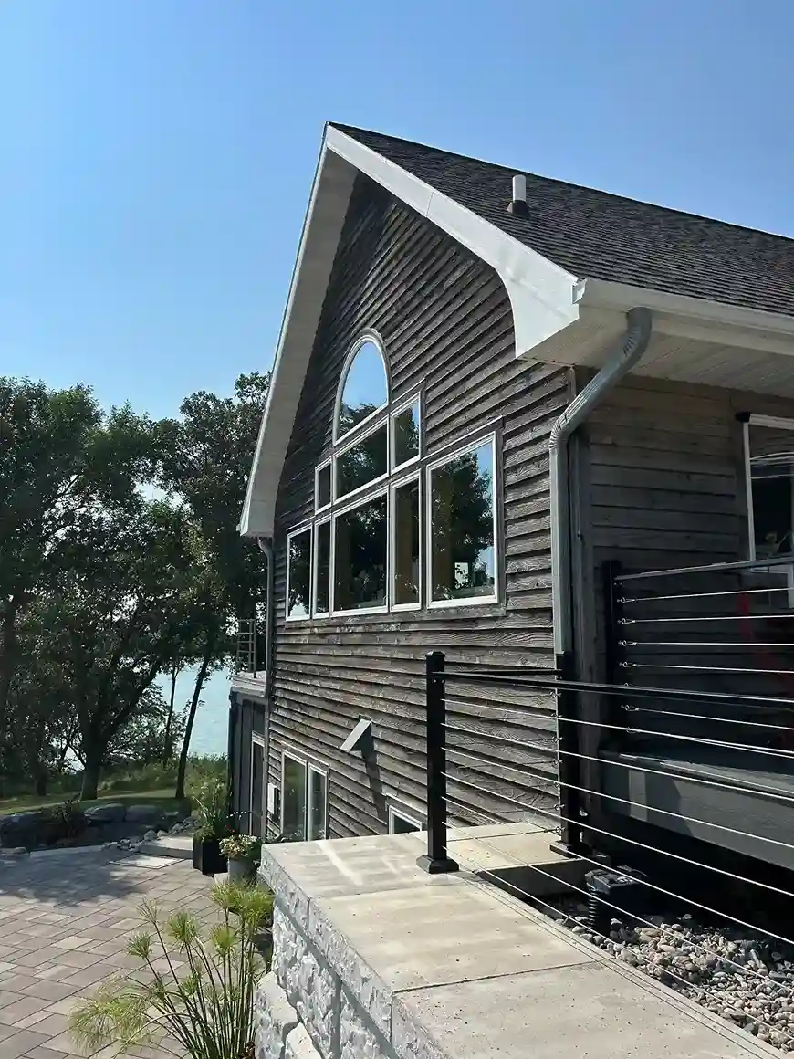 Professional exterior window cleaning using purified water pole system in Morris MN